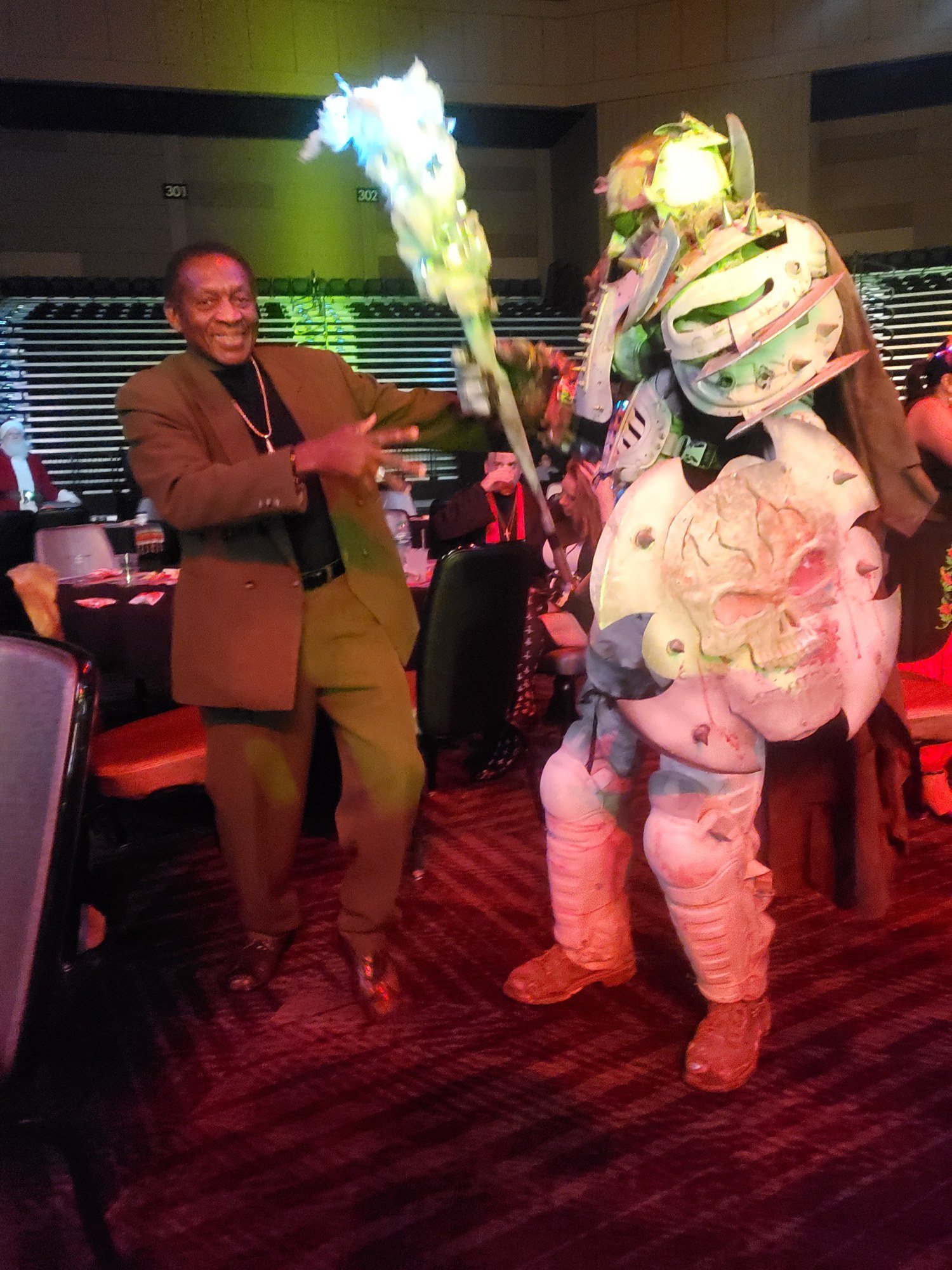A performer in a bright costume on stage